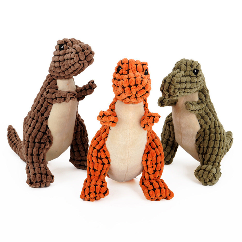 Drei Dinosaurier-Kauspielzeuge in verschiedenen Farben