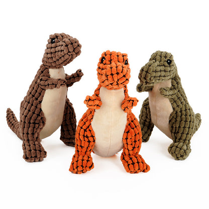 Drei Dinosaurier-Kauspielzeuge in verschiedenen Farben